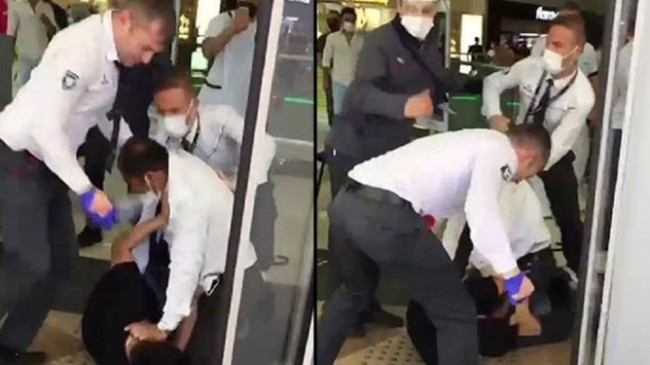 Antalya’da bir AVM’de maske takmayan bir kişiyle güvenlik görevlileri arasında tekme tokat kavga yaşandı
